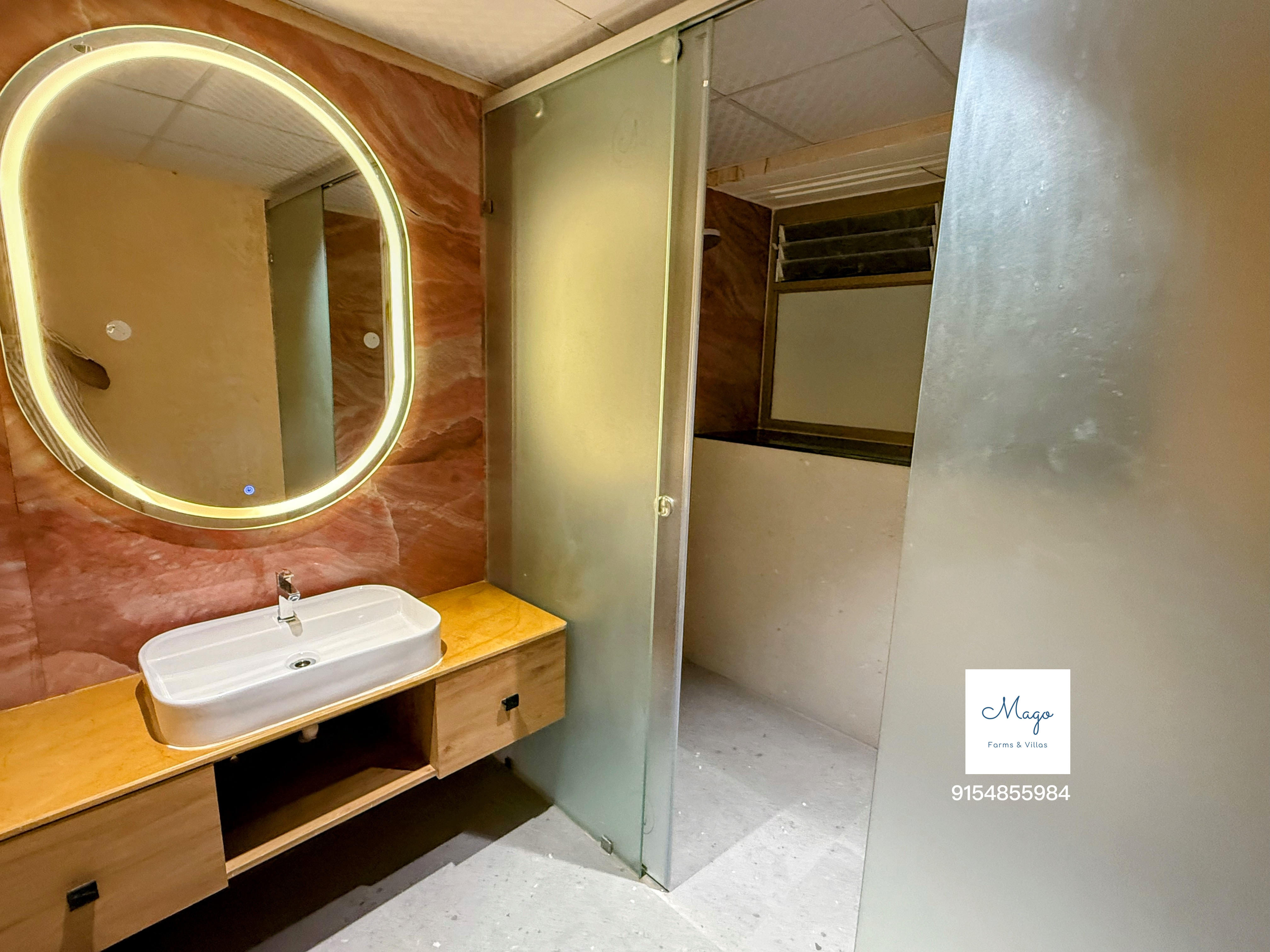 Bathroom with backlit mirror