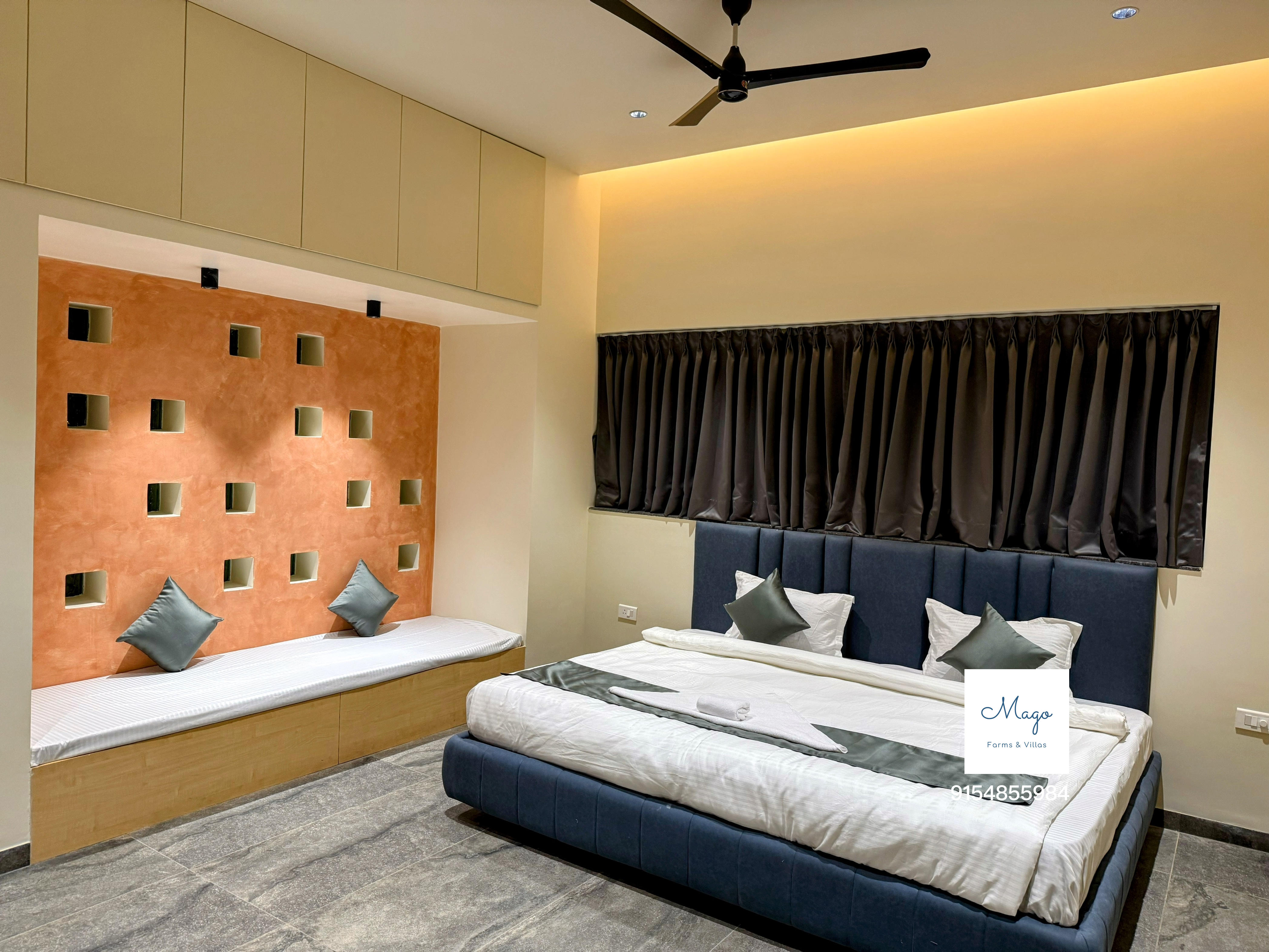Bedroom with terracotta feature wall