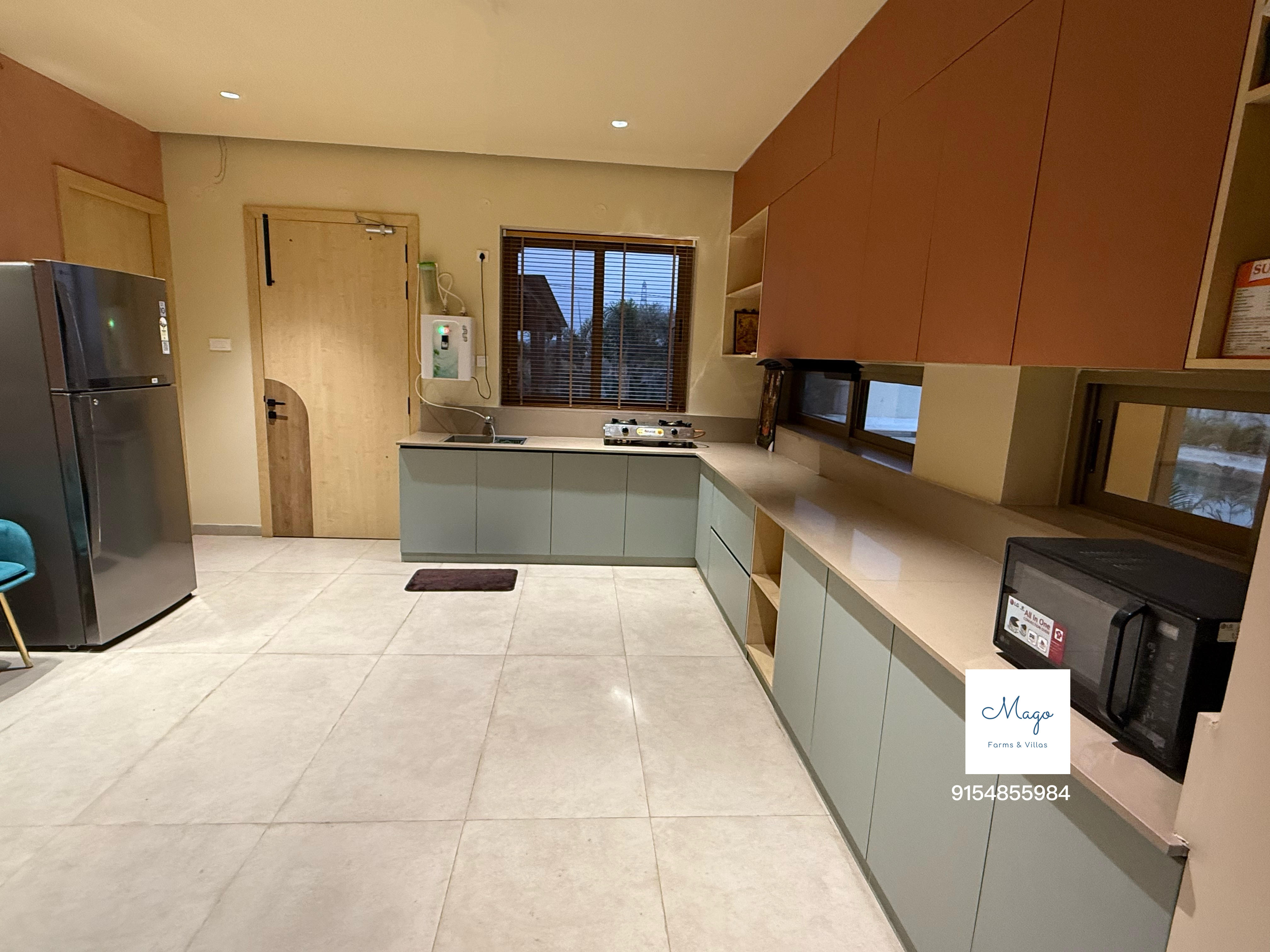 Kitchen with stove and cabinets